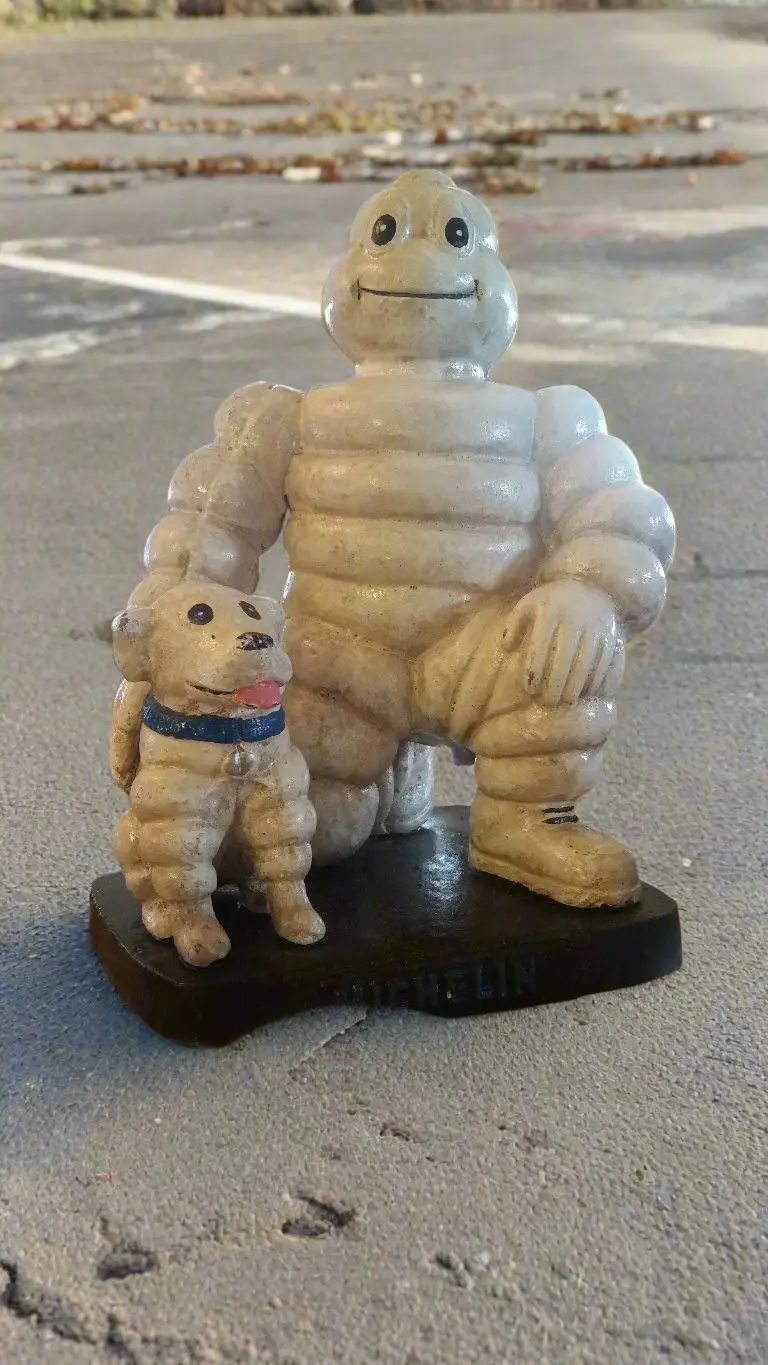 Michelin  Figurine -Cast Iron Michelin Man Kneel W/ Michelin Dog 1