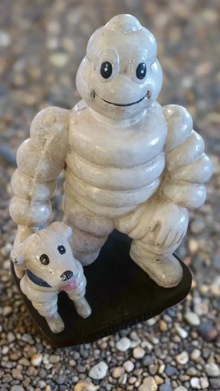 Michelin Figurine -Cast Iron Michelin Man Kneel W/ Michelin Dog 2
