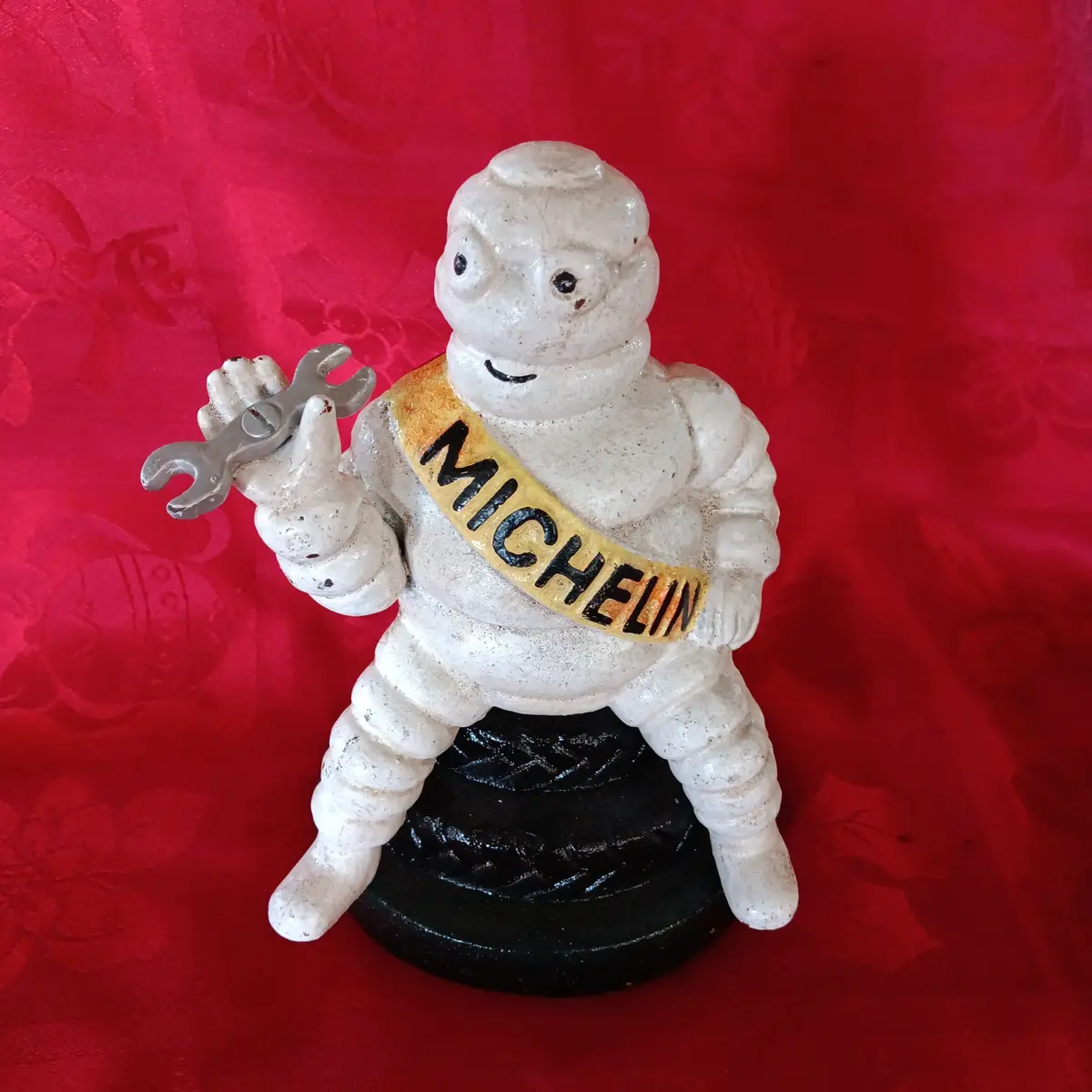 Michelin Figurine -Cast Iron  Michelin Man Sitting On Tire Advertising Piece 1