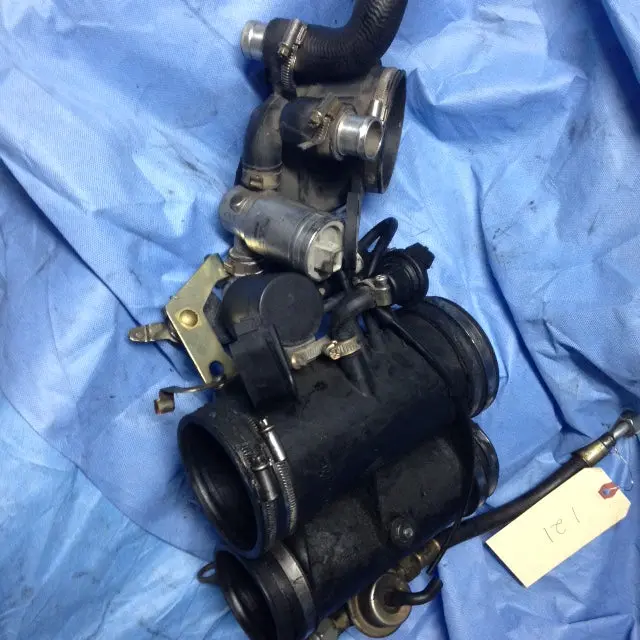 964 Intake Manifold Tubes 964 993.110.027.03 Throttle Body,  Vacuum Unit, Muffler, Idle Speed Adjuster, Bleeder Valve,
Fuel Pressure Reg, 2 Fuel Lines - 964.110.128.00 1