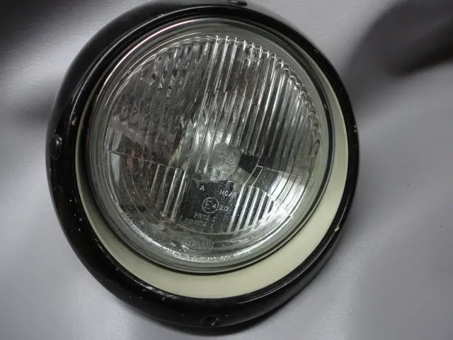 911 H4 Headlight Hella Flat With Black Trim Rings Sold As A Pair 1