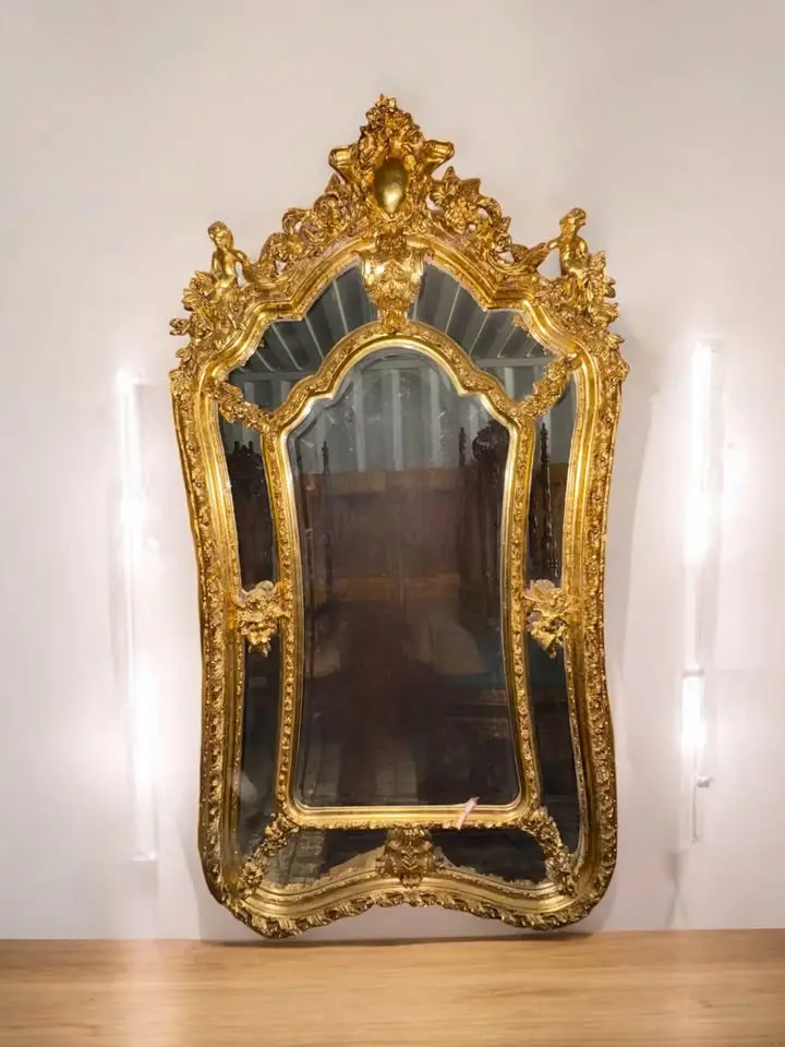 Baroque Gilt Mirror With Cherub Crest & Shaped Glass 1