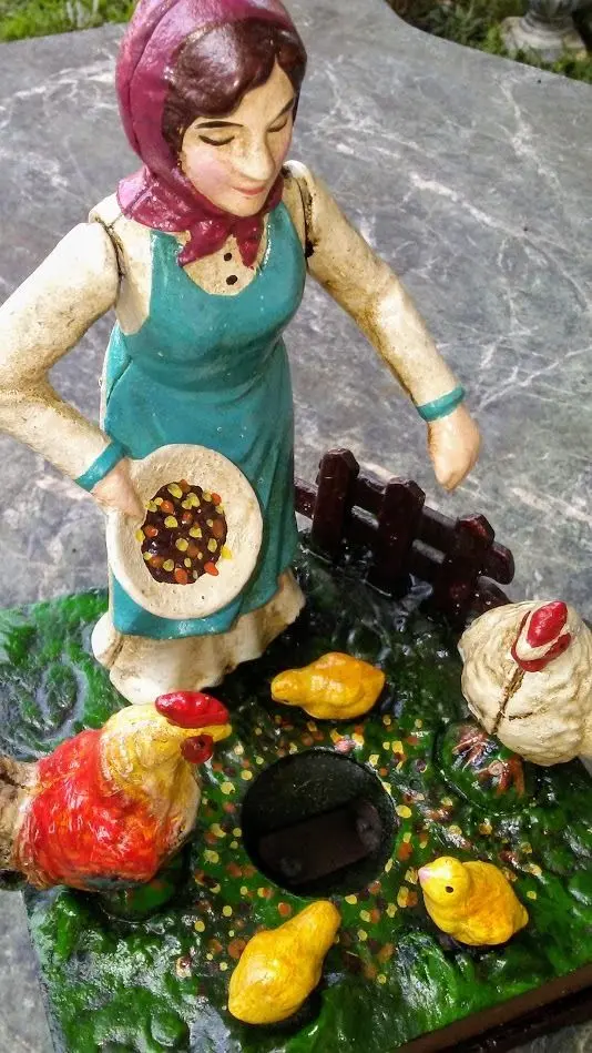 Cast Iron Mechanical Bank - Farm Woman Feeding Chickens Musical 1