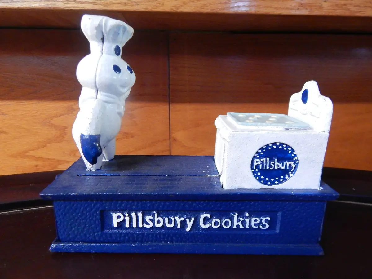 Cast Iron Mechanical Bank - Pillsbury Doughboy 1
