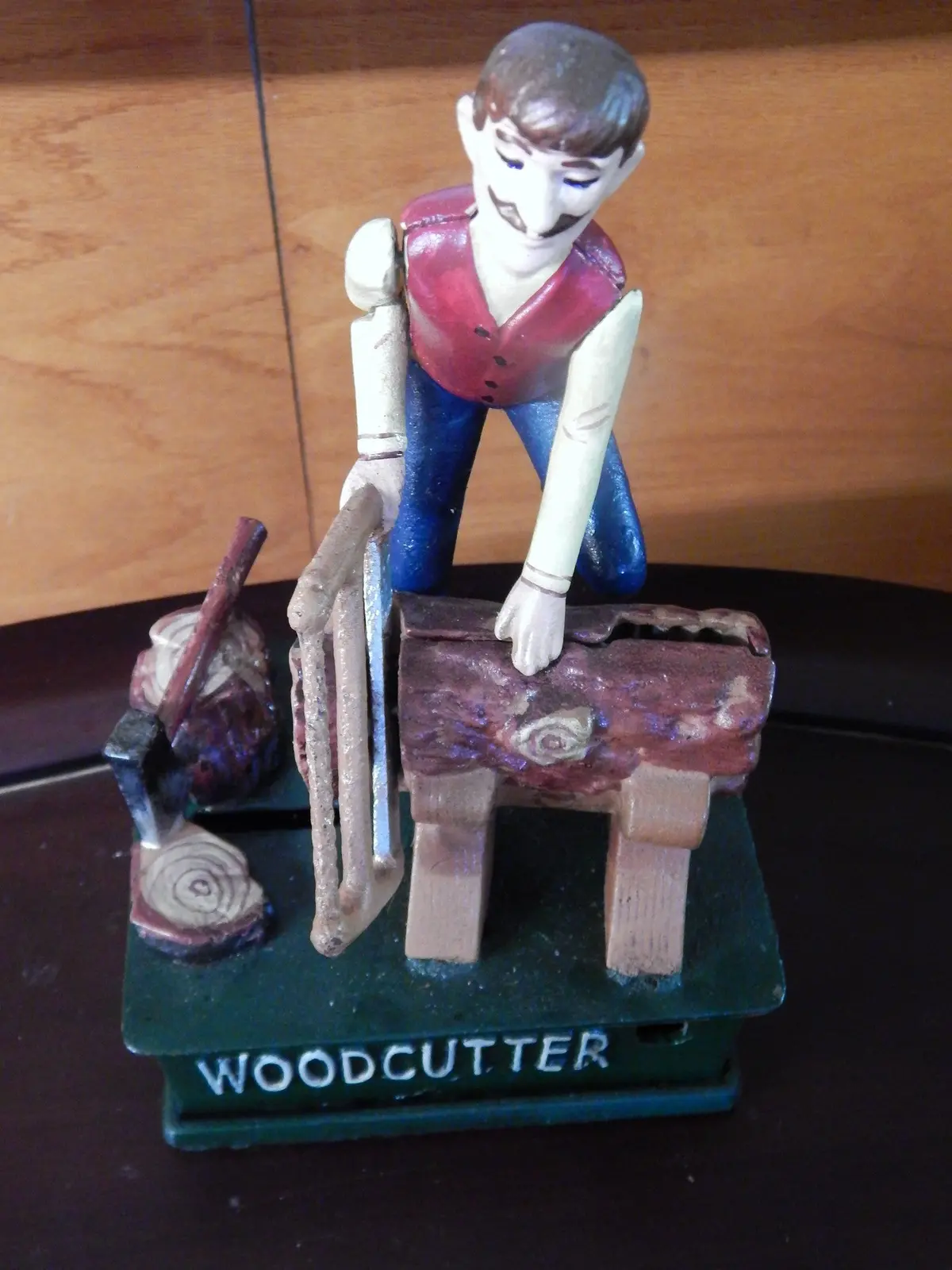 Cast Iron Mechanical Bank - Wood Cutter Coin Bank 1
