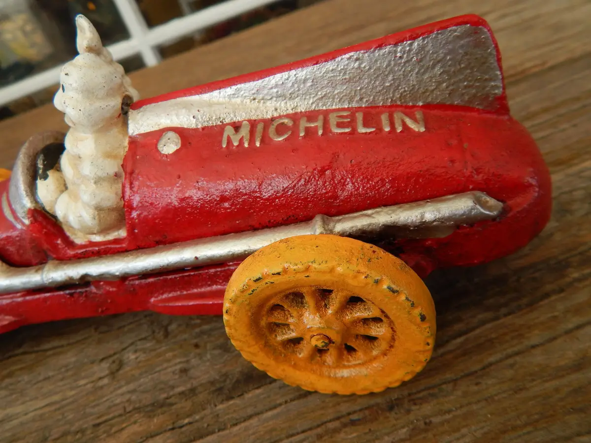 Michelin Figurine - Cast Iron Michelin Tire Advertising Red Race Car Toy 2