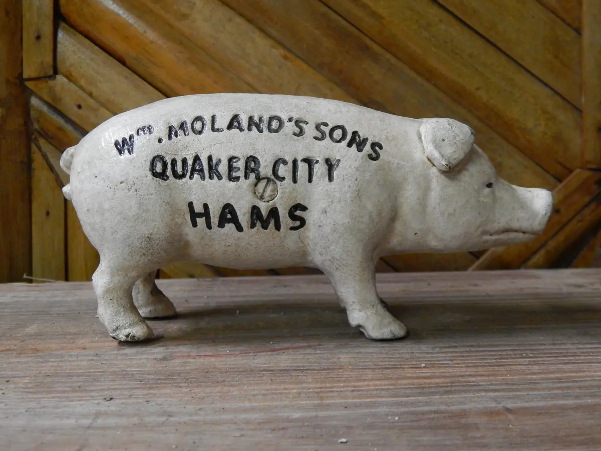 Pig  Bank -Cast Iron  "Wm Moland's Sons Quaker City Hams" Blue Advertising 1