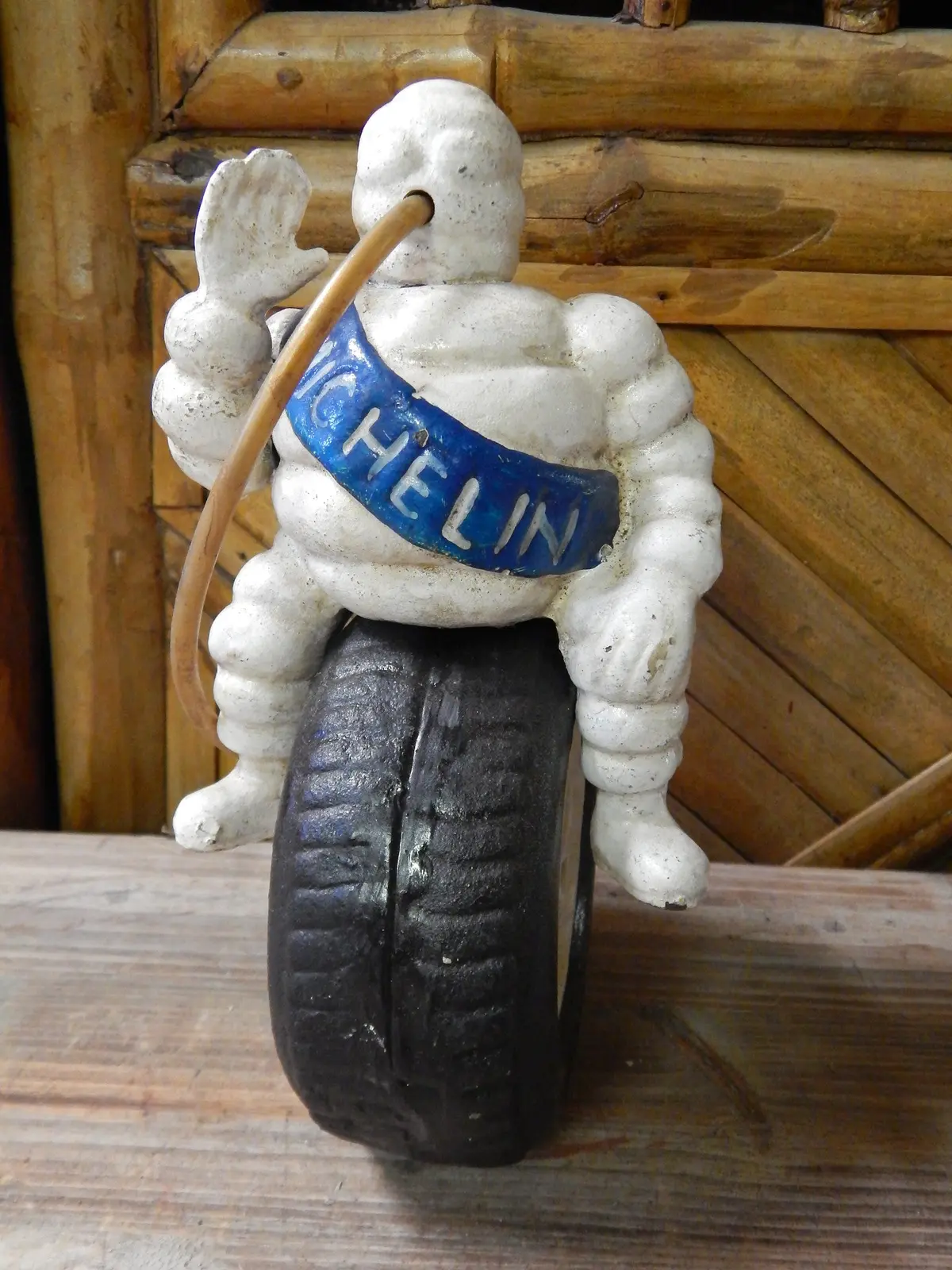 Michelin Figurine -Cast Iron  Michelin Man Bibendum On Tire Advertising Piece 1