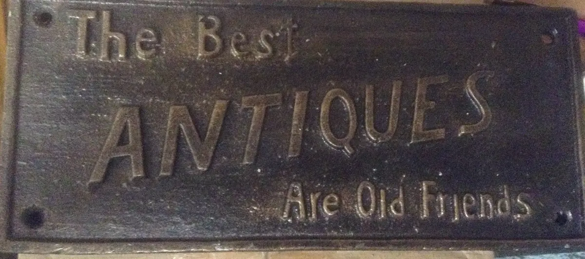 Cast Iron Sign - "The Best Antiques" 1