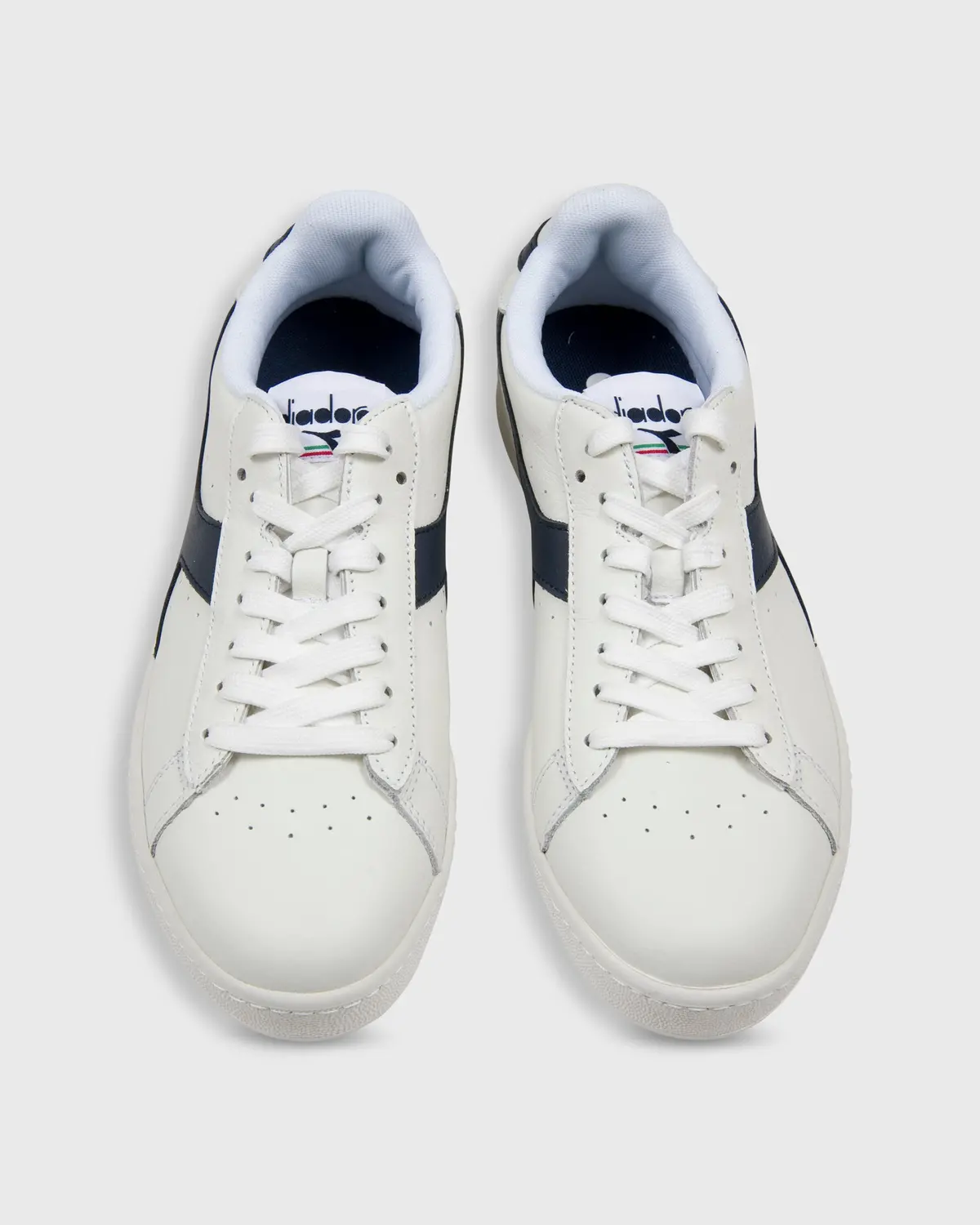 Game L Low Sneaker In White/Navy 1