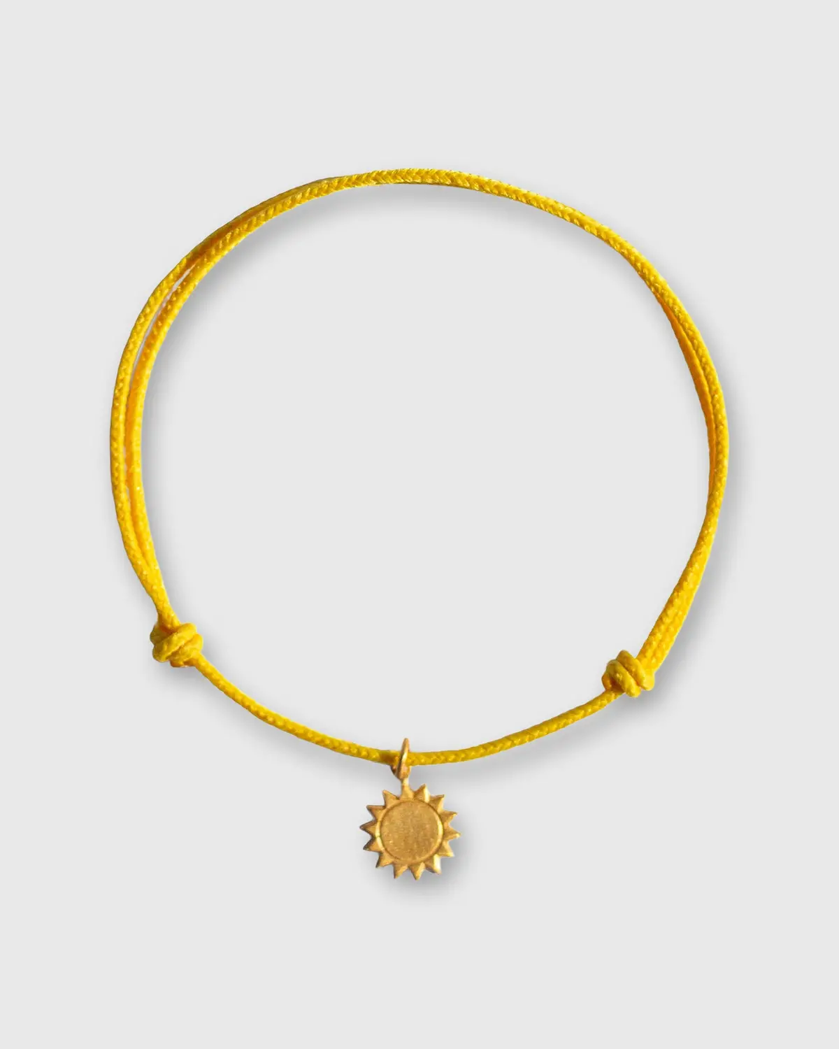 Small Sun Charm Bracelet In Gold/Assorted Color Cord 1