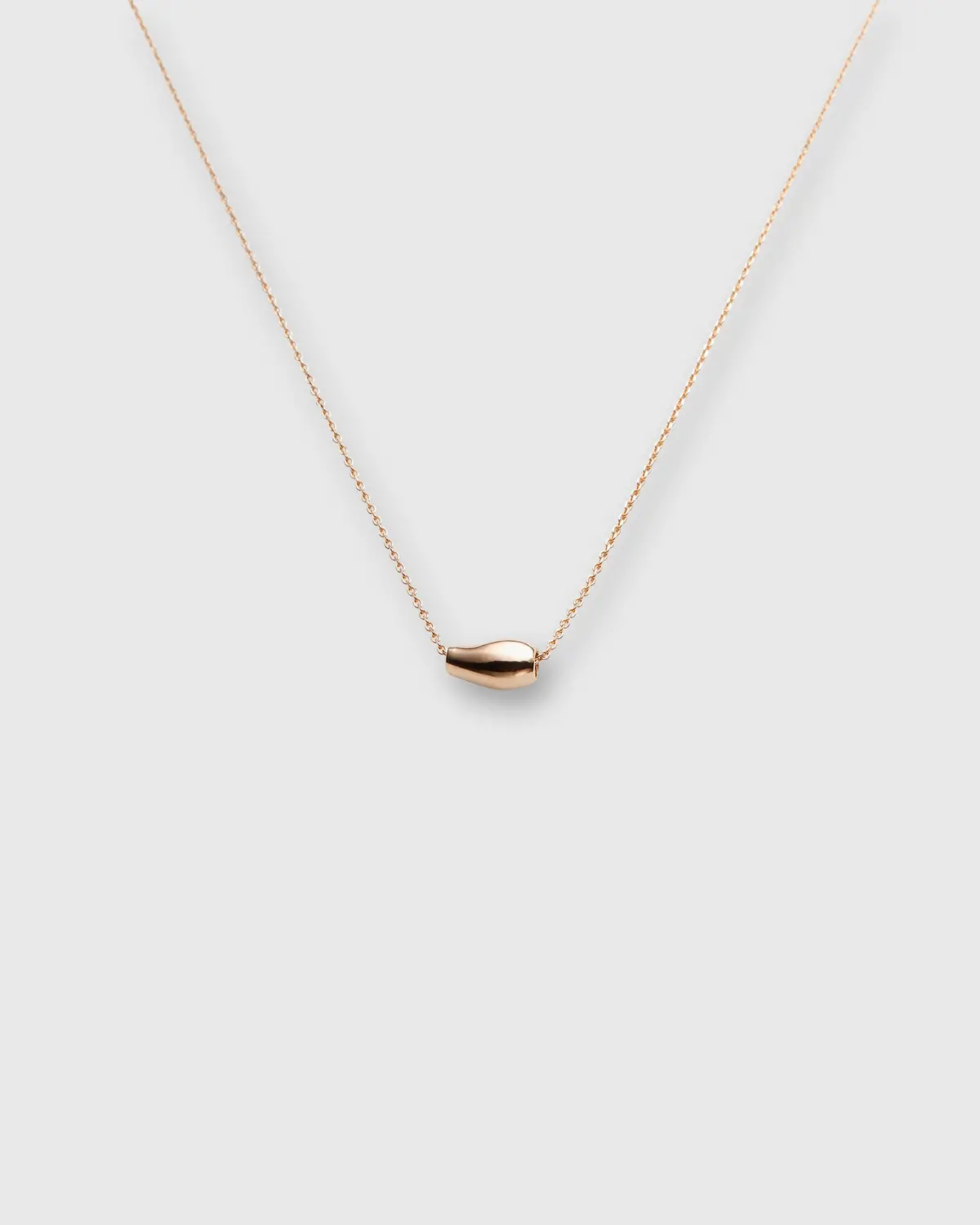 Organic Bead Pendant Necklace In Gold 1