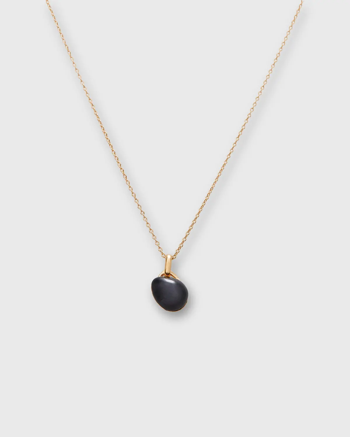 Tiny Ceramic Egg Pendant Necklace In Soot/Gold 1