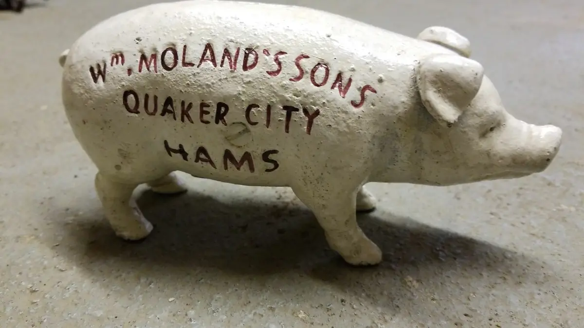 Pig Bank -Cast Iron "Wm Moland's Sons Quaker City Hams" Red Advertising 1