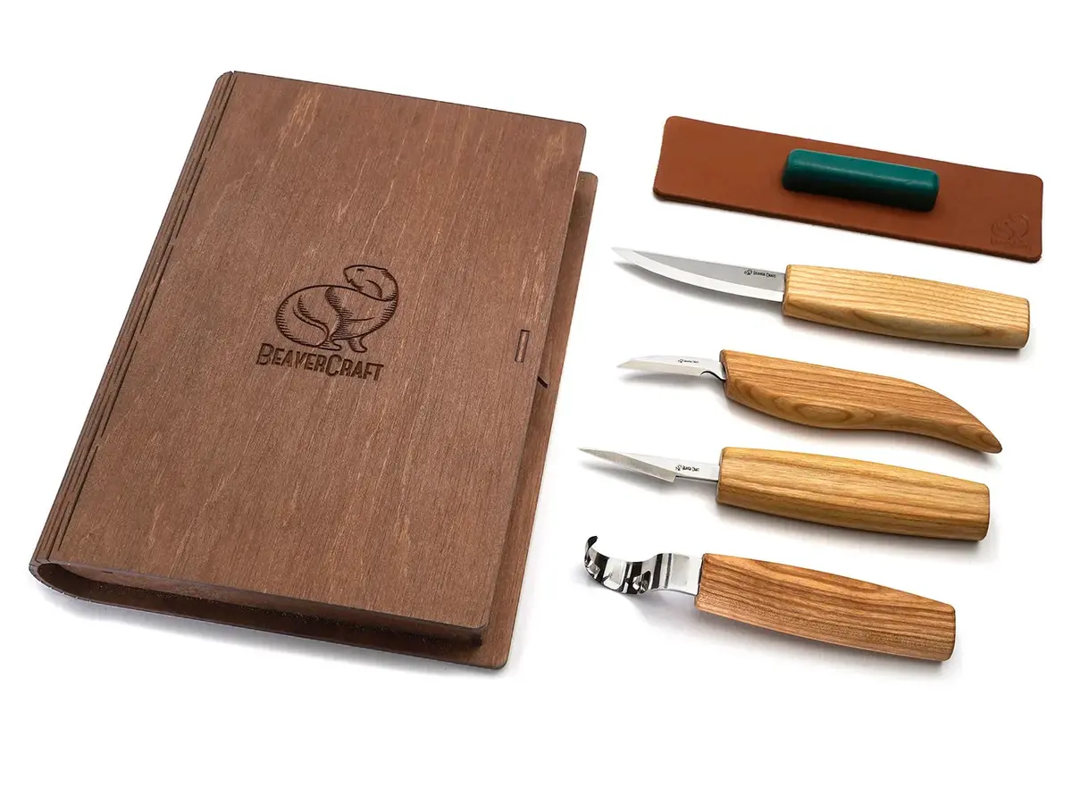 Set Of 4 Knives In A Book Case 1